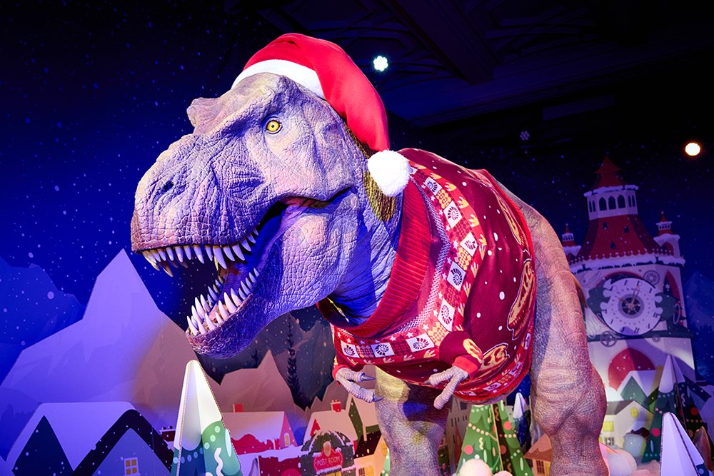 The Natural History Museum T. rex in a Christmas hat
